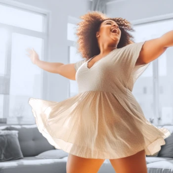 Woman dancing in her living room